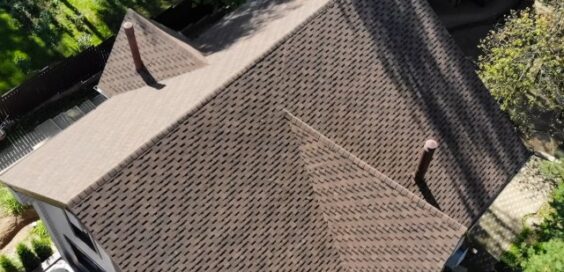 https://stock.adobe.com/images/bituminous-tile-for-a-roof-a-roof-from-a-bituminous-tile-moder/305797874